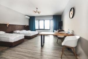 Postel nebo postele na pokoji v ubytování Sofia Hotel