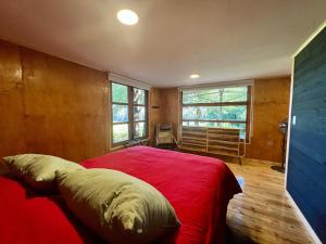Postel nebo postele na pokoji v ubytování Lodge Colchagua Camp