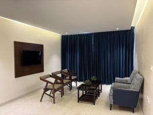 Χώρος καθιστικού στο Mayur Belgaum Presidency Hotel & Spa
