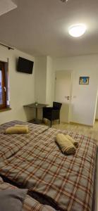 Postel nebo postele na pokoji v ubytování Hotel und Restaurant Adriatic