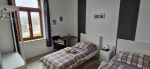Postel nebo postele na pokoji v ubytování Hotel und Restaurant Adriatic
