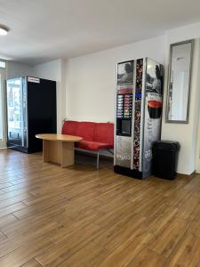 a living room with a couch and a coffee table at Zajazd Polonia in Kędzierzyn-Koźle