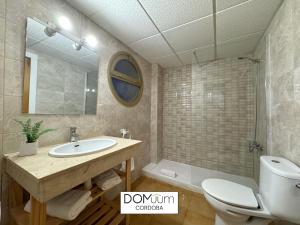 Kúpeľňa v ubytovaní DOMuum Holidays - CORDOBA Apartments