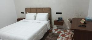 Postel nebo postele na pokoji v ubytování Hotel De Provence