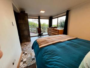 Postel nebo postele na pokoji v ubytování Lodge Colchagua Camp