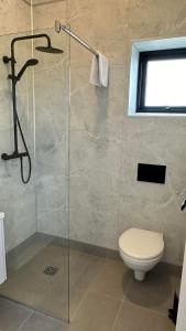 Koupelna v ubytování HH Gisting/Guesthouse + 12 fotografií