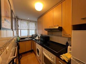 Kuchyň nebo kuchyňský kout v ubytování Apartamento Puerto Estepona