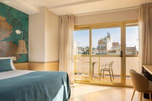 Posteľ alebo postele v izbe v ubytovaní htop Amaika & SPA 4Sup - Adults Only #htopBliss