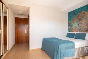 Posteľ alebo postele v izbe v ubytovaní htop Amaika & SPA 4Sup - Adults Only #htopBliss