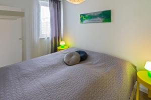 Ein Bett oder Betten in einem Zimmer der Unterkunft Ferienhaus Kim
