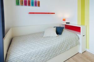 Ein Bett oder Betten in einem Zimmer der Unterkunft Ferienhaus Kim