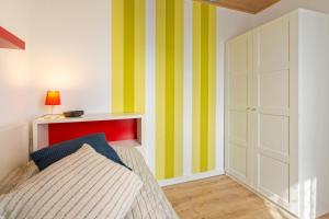 Ein Bett oder Betten in einem Zimmer der Unterkunft Ferienhaus Kim