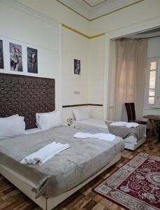 Postel nebo postele na pokoji v ubytování Pa la ce court + 37 fotografií