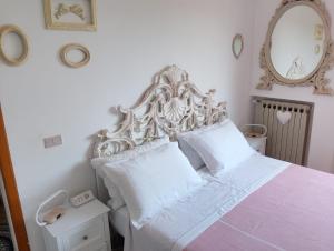 Postel nebo postele na pokoji v ubytování SALGE b&b RESIDENZA DI CHARME