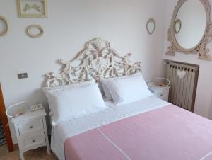 Postel nebo postele na pokoji v ubytování SALGE b&b RESIDENZA DI CHARME