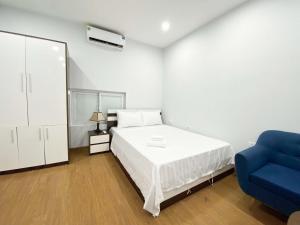 Postel nebo postele na pokoji v ubytování Eco Nest Hotel Đình Ngang