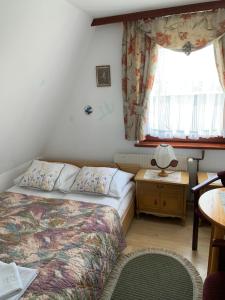 Postel nebo postele na pokoji v ubytování Pokoje u Zofii