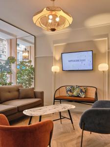 Posezení v ubytování Hotel Etoile Saint Ferdinand by Happyculture