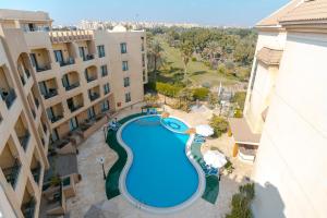The swimming pool at or close to Swiss Inn Plaza Hotel
