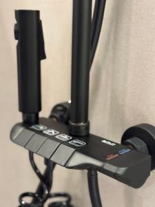 a close up of a tripod with a camera on it at Marvin Suites in Al Wajh +8 photos