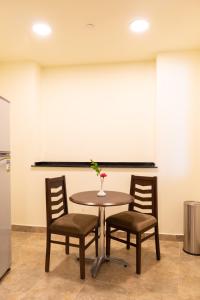 A seating area at Swiss Inn Plaza Hotel