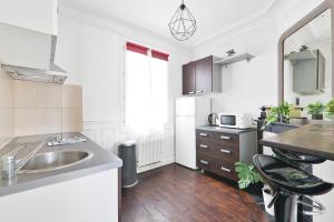 Afbeelding uit fotogalerij van Heart of Paris 1BR-2P Montparnasse Free Netflix in Parijs +7 foto's