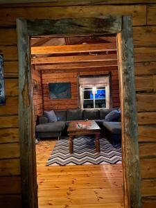 Postel nebo postele na pokoji v ubytování Cottage with good standard next to Neiden river