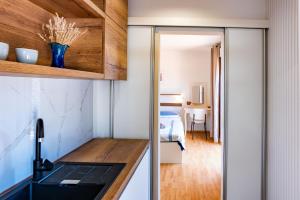 Kuchyň nebo kuchyňský kout v ubytování Guesthouse Mira