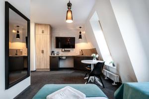 Kuchyňa alebo kuchynka v ubytovaní Apartamenty Wodna 13