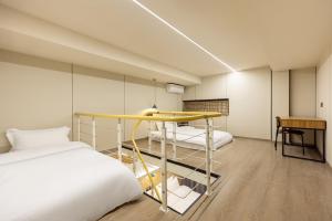 Postel nebo postele na pokoji v ubytování 珠珠酒店 上海浦东国际机场店