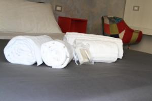 Posteľ alebo postele v izbe v ubytovaní san rocco apartments