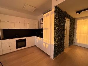 Η κουζίνα ή μικρή κουζίνα στο AH Sky park 3D - 20th Floor sunset views - parking +12 φωτογραφίες