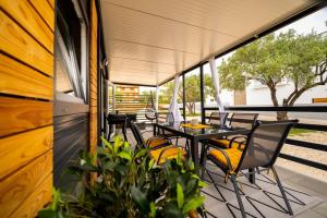 Balkón nebo terasa v ubytování Cosy modern mini house 11 by the sea with private terrace in Limoni Camp - Walk to Beach & Local Taverns