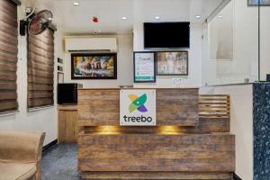 TV a/nebo společenská místnost v ubytování Treebo Vinayak Inn, Jagatpura