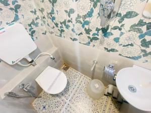 Bagno di Hotel RV Residency