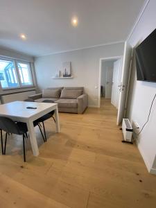 Телевизор и/или развлекательный центр в Ausblick residence