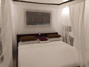 Katil atau katil-katil dalam bilik di Spacious Villa in Watamu with Private Pool +18 gambar