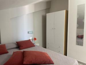 A bed or beds in a room at Villa Lilium