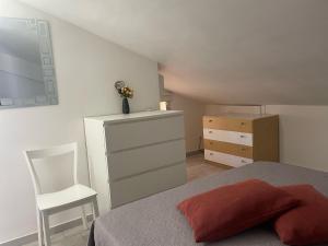 A bed or beds in a room at Villa Lilium