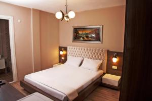 Cama o camas de una habitación en Golf Royal Residence