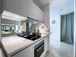 a kitchen with a stove top oven in a room at Vortex Residence KLCC ,12 Jalan Sultan Ismail Kuala Lumpur in Kuala Lumpur