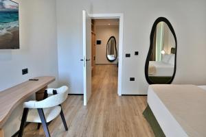 Postel nebo postele na pokoji v ubytování Asters Hotel