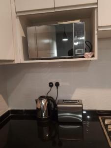 Kuchyň nebo kuchyňský kout v ubytování Fully serviced apartments solwezi