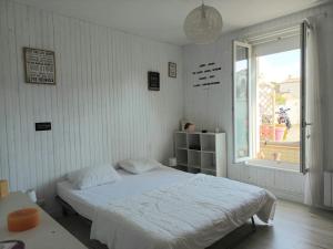 Postel nebo postele na pokoji v ubytování Maison Port de la Côtinière à 150m de la plage