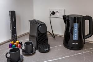Set per la preparazione di tè e caffè presso 5 minutes from Via Roma - with Smart TV