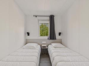 Ένα ή περισσότερα κρεβάτια σε δωμάτιο στο Chalet neuf pour 6 avec piscine chauffée à l'année +18 φωτογραφίες