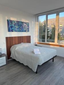 Ένα ή περισσότερα κρεβάτια σε δωμάτιο στο Fátima Serenity Apartments - Serenity 2