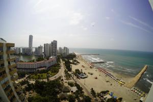 a view of a beach with buildings and the ocean at Hotel Dorado Plaza Bocagrande - All Inclusive in Cartagena de Indias