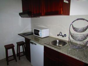 Kuchyň nebo kuchyňský kout v ubytování ATCamões