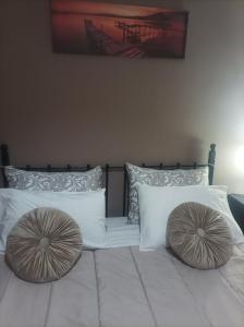 A bed or beds in a room at Eirini's Apartment